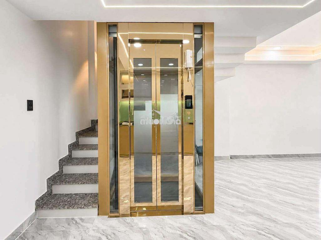 Hẻm xe hơi thông tứ hướng - 6 tầng có thang máy - có gara để xe hơi - 4