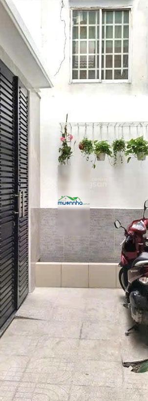 Nguyễn bỉnh khiêm, p. đa kao, quận 1 chỉ 15m ra đường lớn -4 tầng 3pn- 2 mặt tiền trước và bên hôn - 4